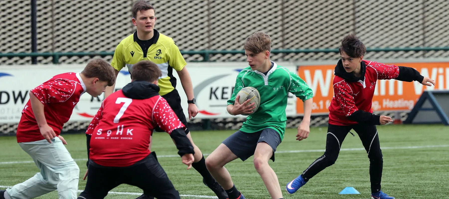 teenage boys playing rugby sohk impact report